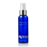 A blue bottle with Rose Hydrating Toner on a white background.